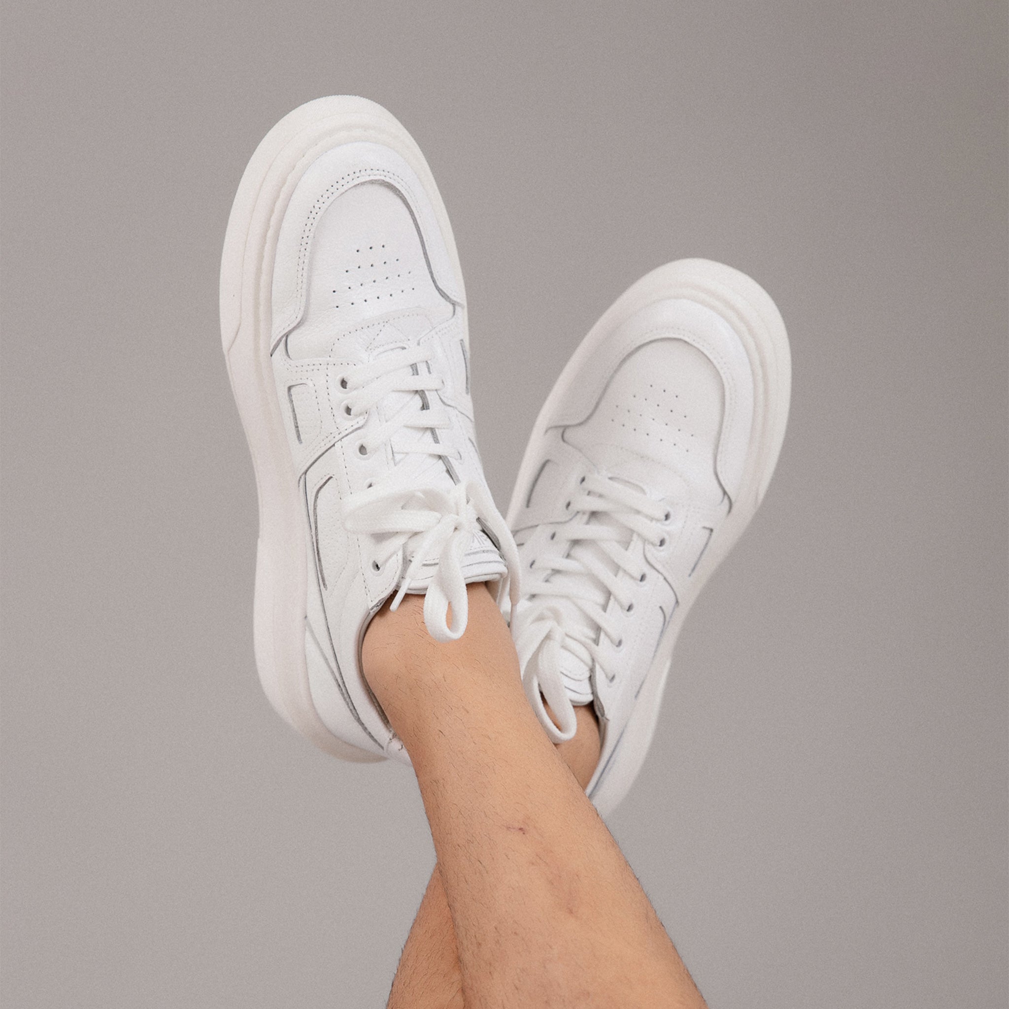 Contemporary Low-Top White Sneakers with Thick Sole