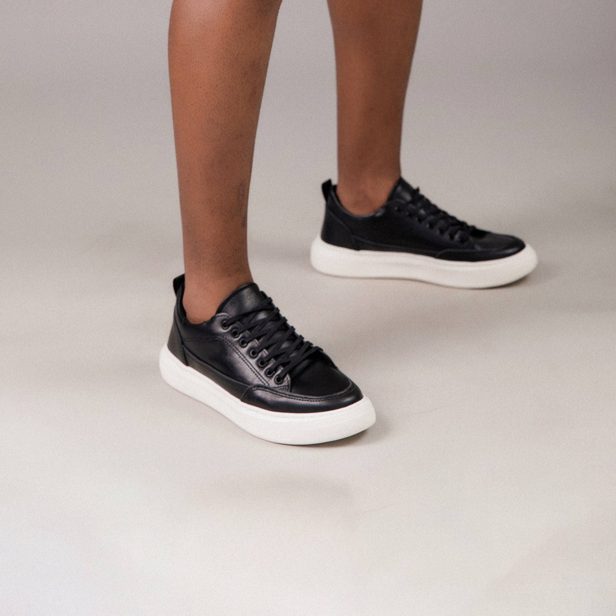 Men’s Black Leather-Effect Trainers with Contrast Sole