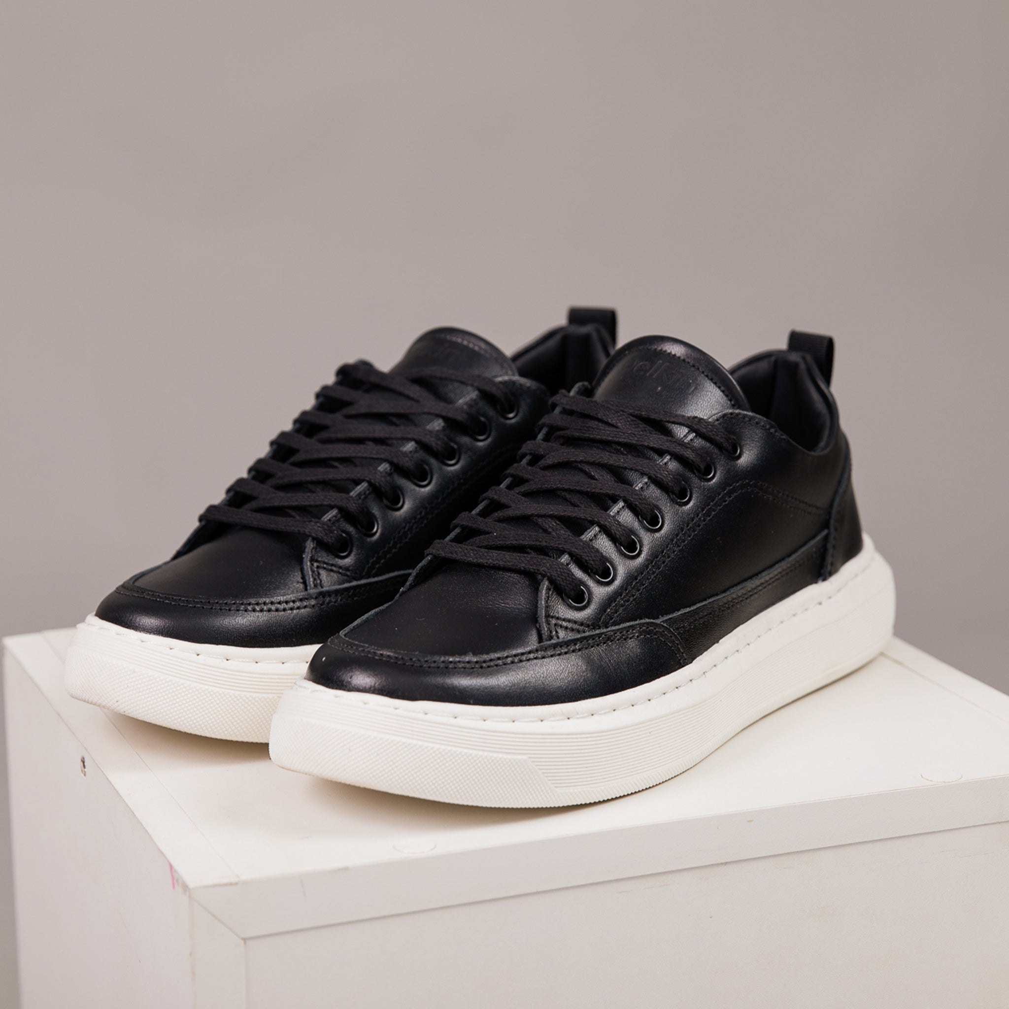 Men’s Black Leather-Effect Trainers with Contrast Sole